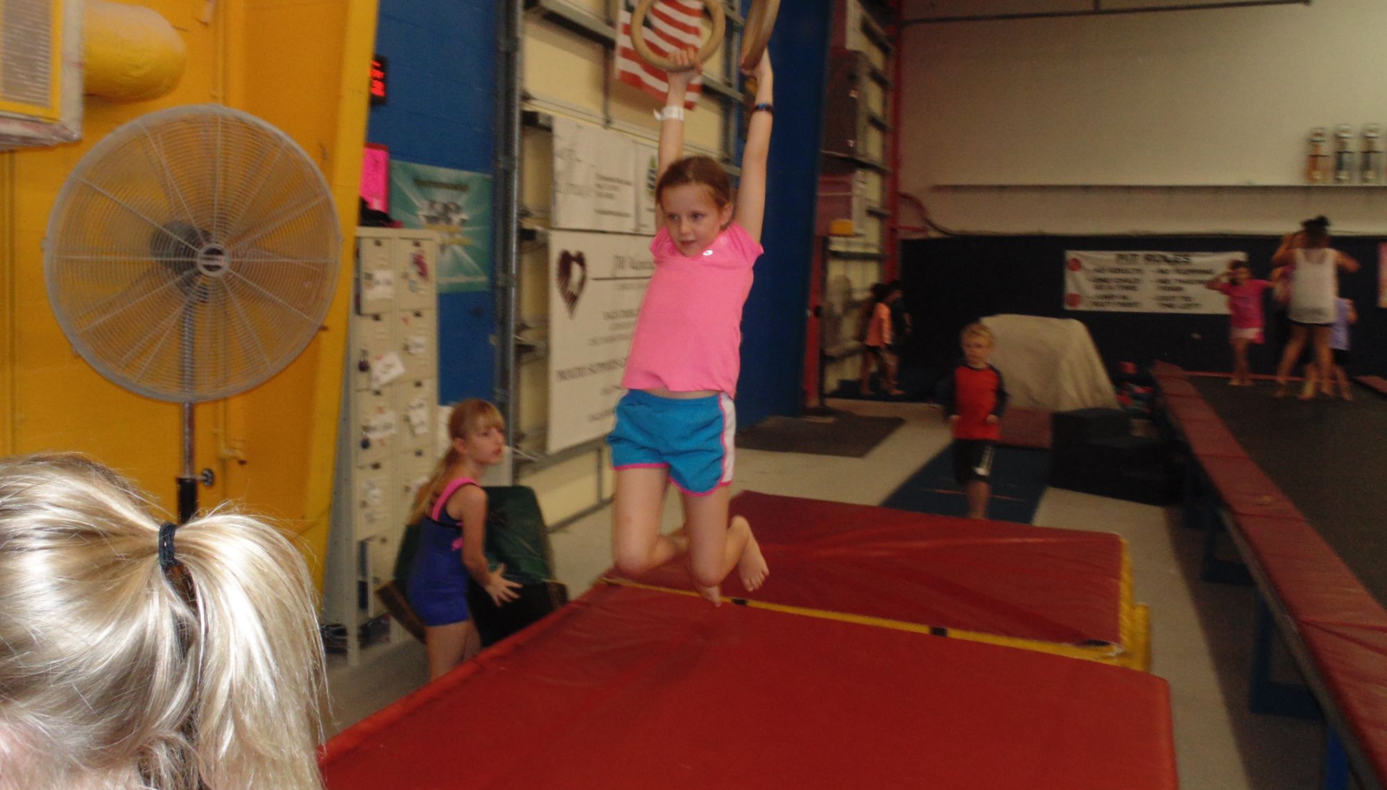 preshool child practicing gymnastics
